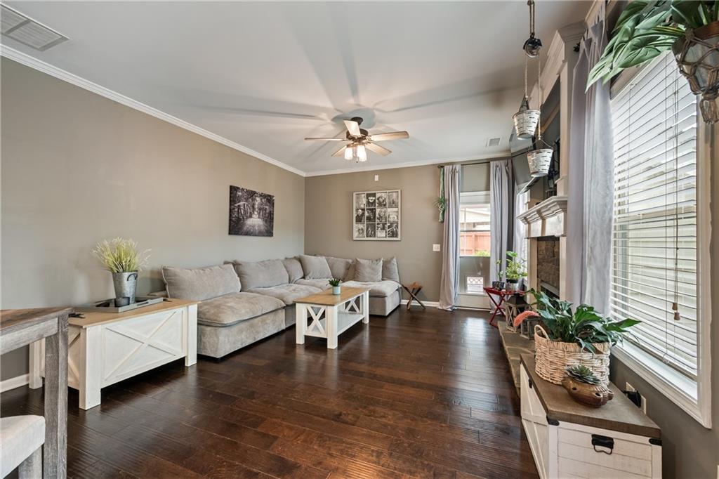 555 Evergreen Way Jefferson, GA 30549 - Photo 19 of 69 a living room with furniture and a large window