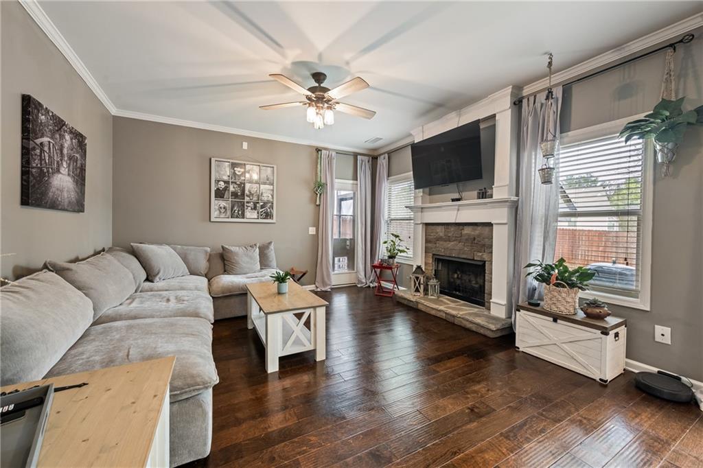 555 Evergreen Way Jefferson, GA 30549 - Photo 20 of 69 a living room with furniture fireplace and a flat screen tv