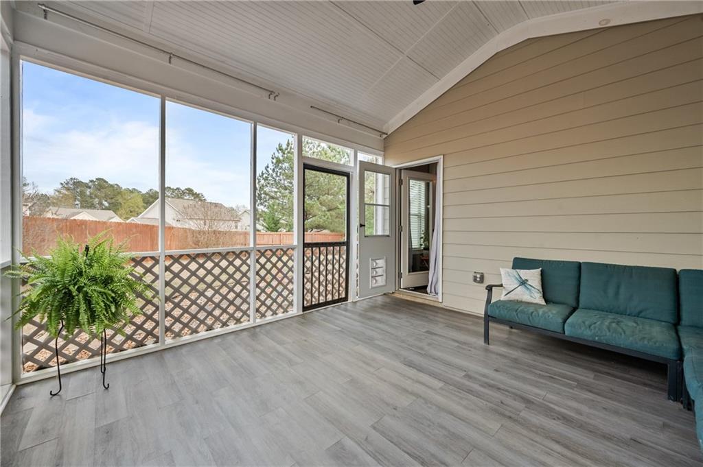 555 Evergreen Way Jefferson, GA 30549 - Photo 30 of 69 a view of a living room hardwood floor and furniture
