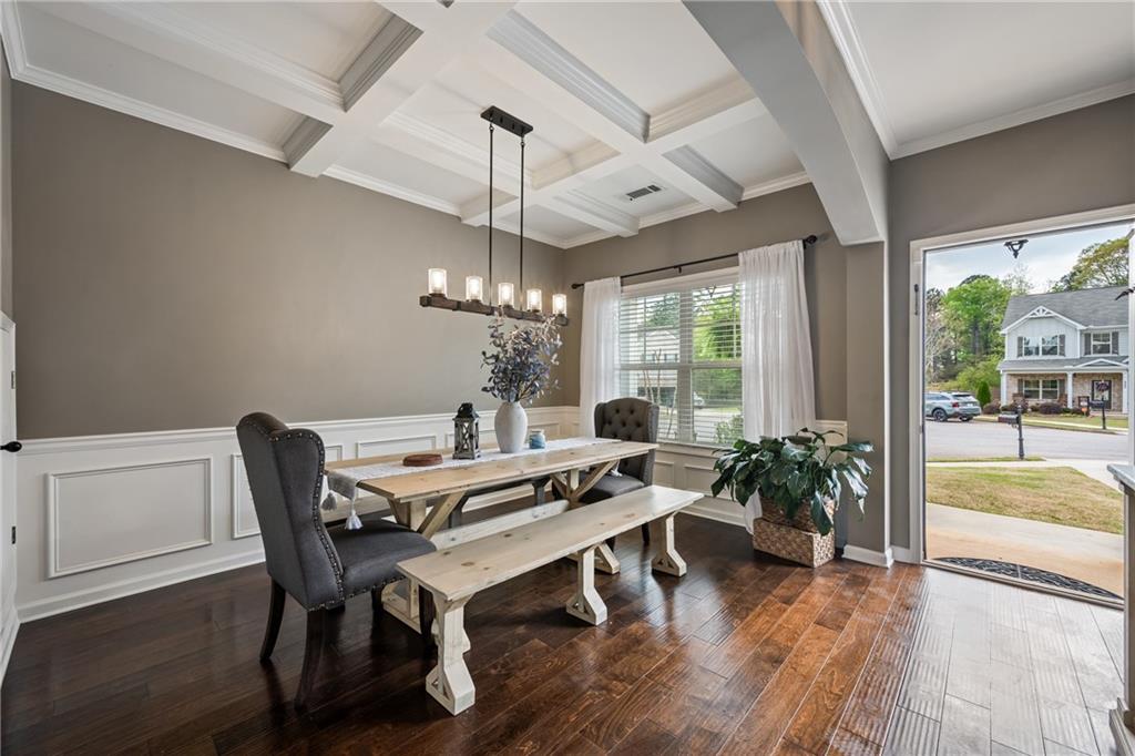 555 Evergreen Way Jefferson, GA 30549 - Photo 3 of 69 a view of a dining room with furniture window and wooden floor