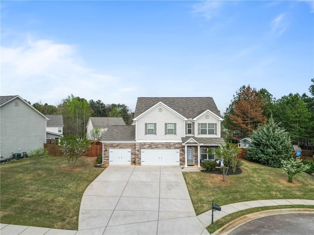555 Evergreen Way Jefferson, GA 30549 - Photo 56 of 69 a view of a house with a yard
