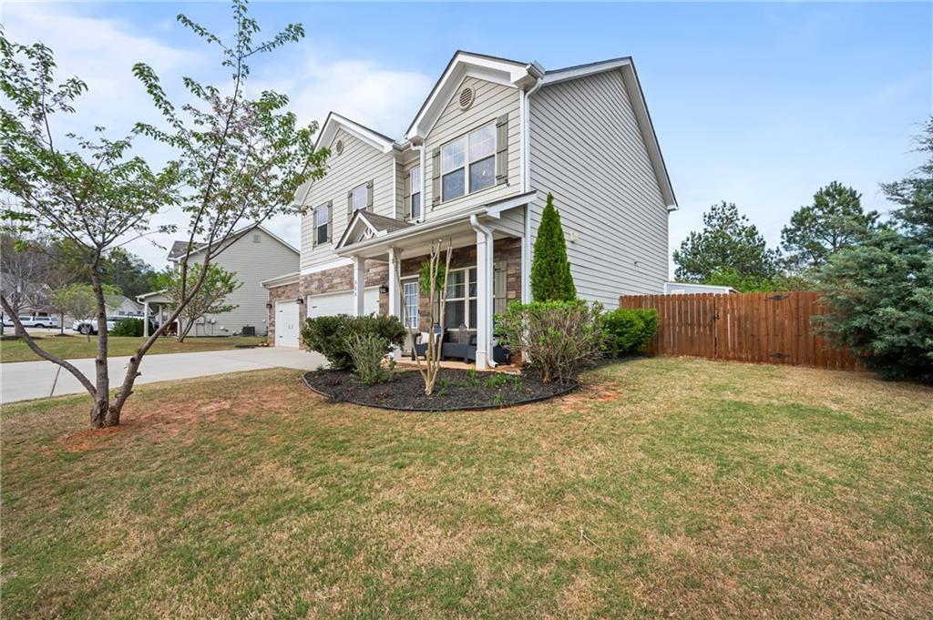 555 Evergreen Way Jefferson, GA 30549 - Photo 61 of 69 a view of a house with backyard and trees
