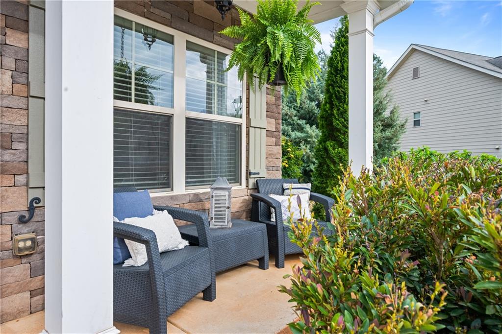 555 Evergreen Way Jefferson, GA 30549 - Photo 8 of 69 a view of backyard with outdoor seating and plants