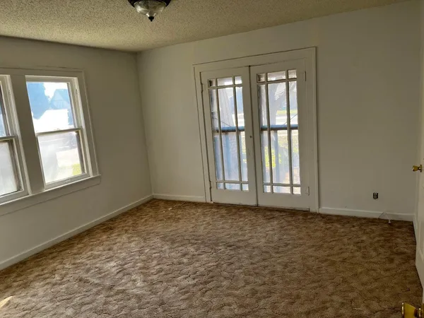 a view of an empty room with window