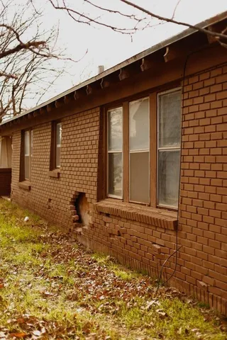 a view of a room with rack and wooden floor