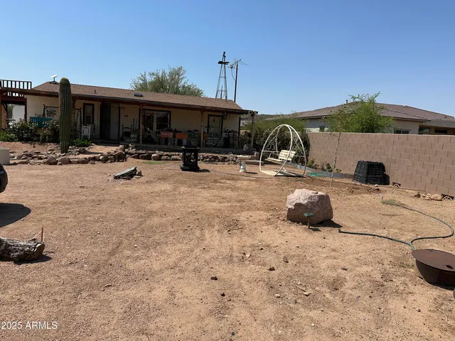 a view of a patio with swimming pool