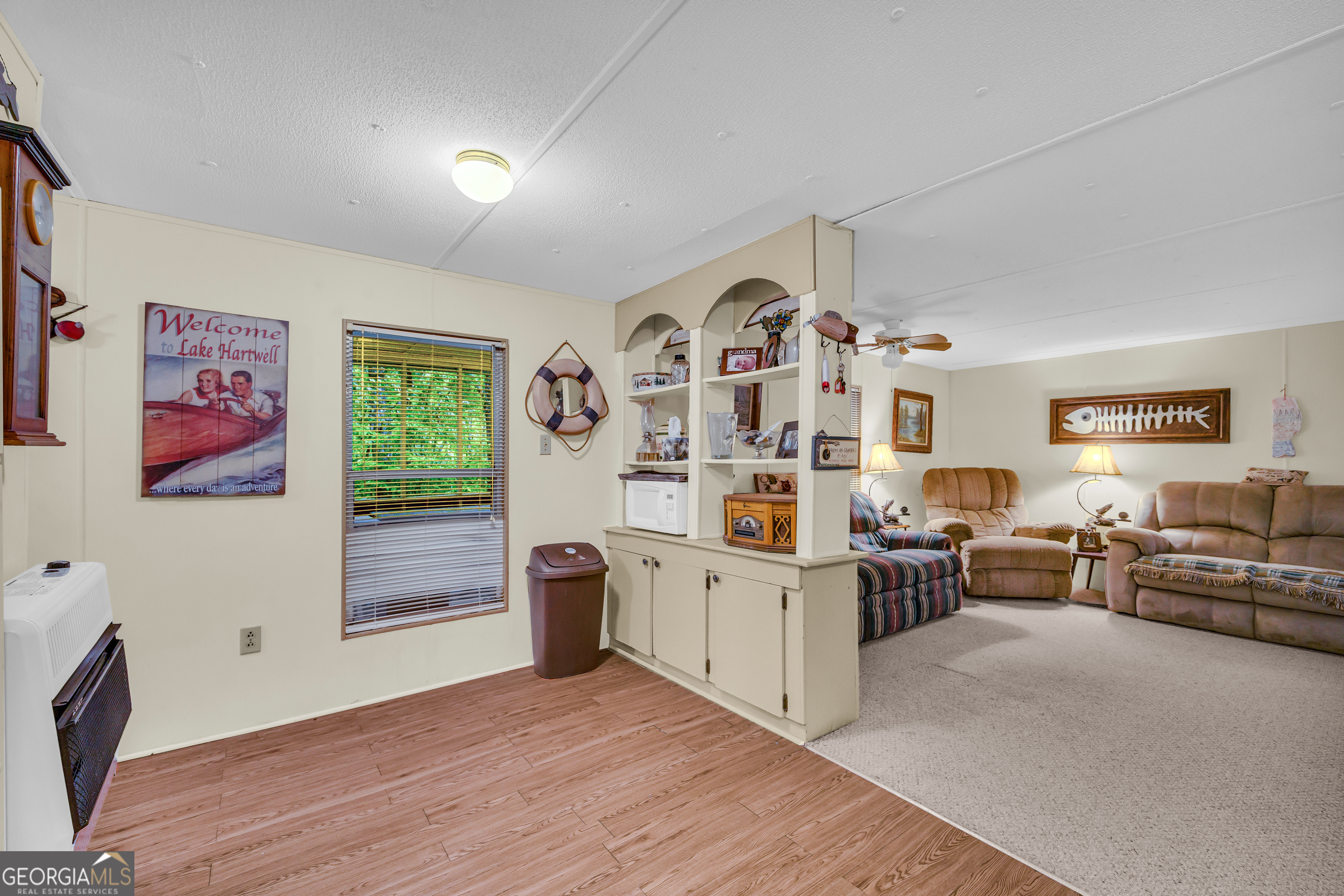 23 Wren Court Toccoa, GA 30577 - Photo 15 of 26 a view of living room filled with furniture and wooden floor