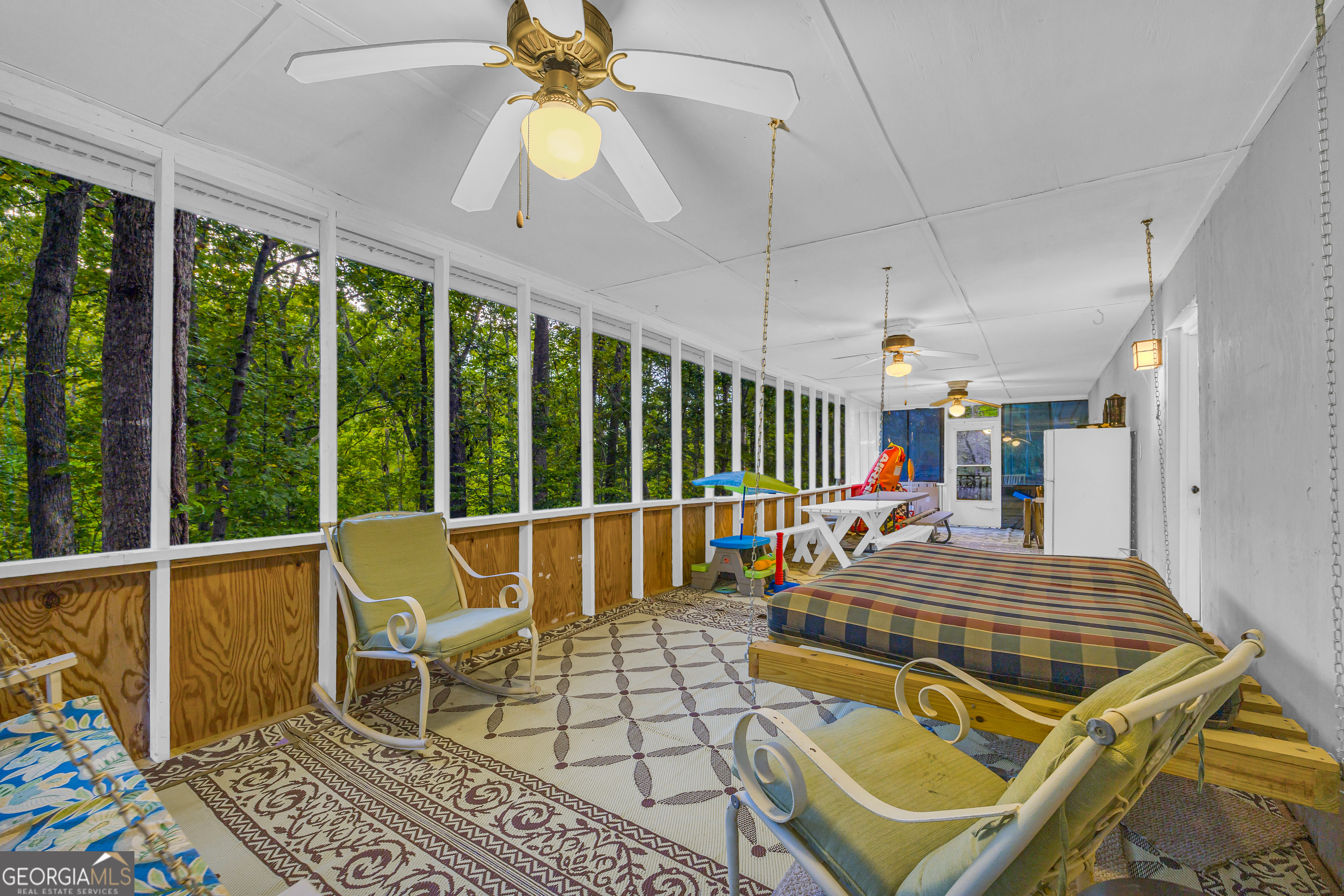 23 Wren Court Toccoa, GA 30577 - Photo 21 of 26 a outdoor space with lots of chairs and a chandelier