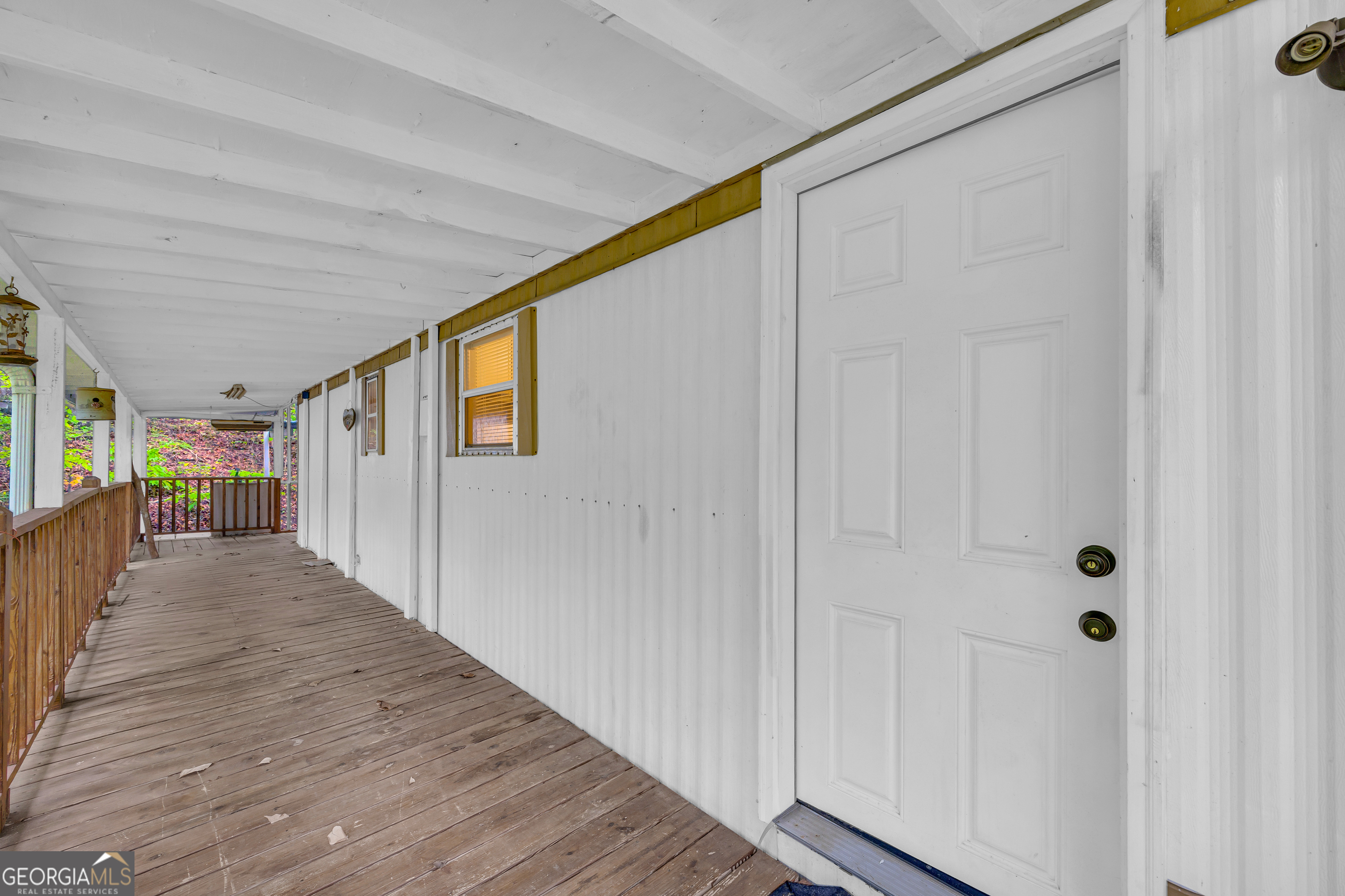 23 Wren Court Toccoa, GA 30577 - Photo 7 of 26 a view of a hallway with wooden floor and entryway
