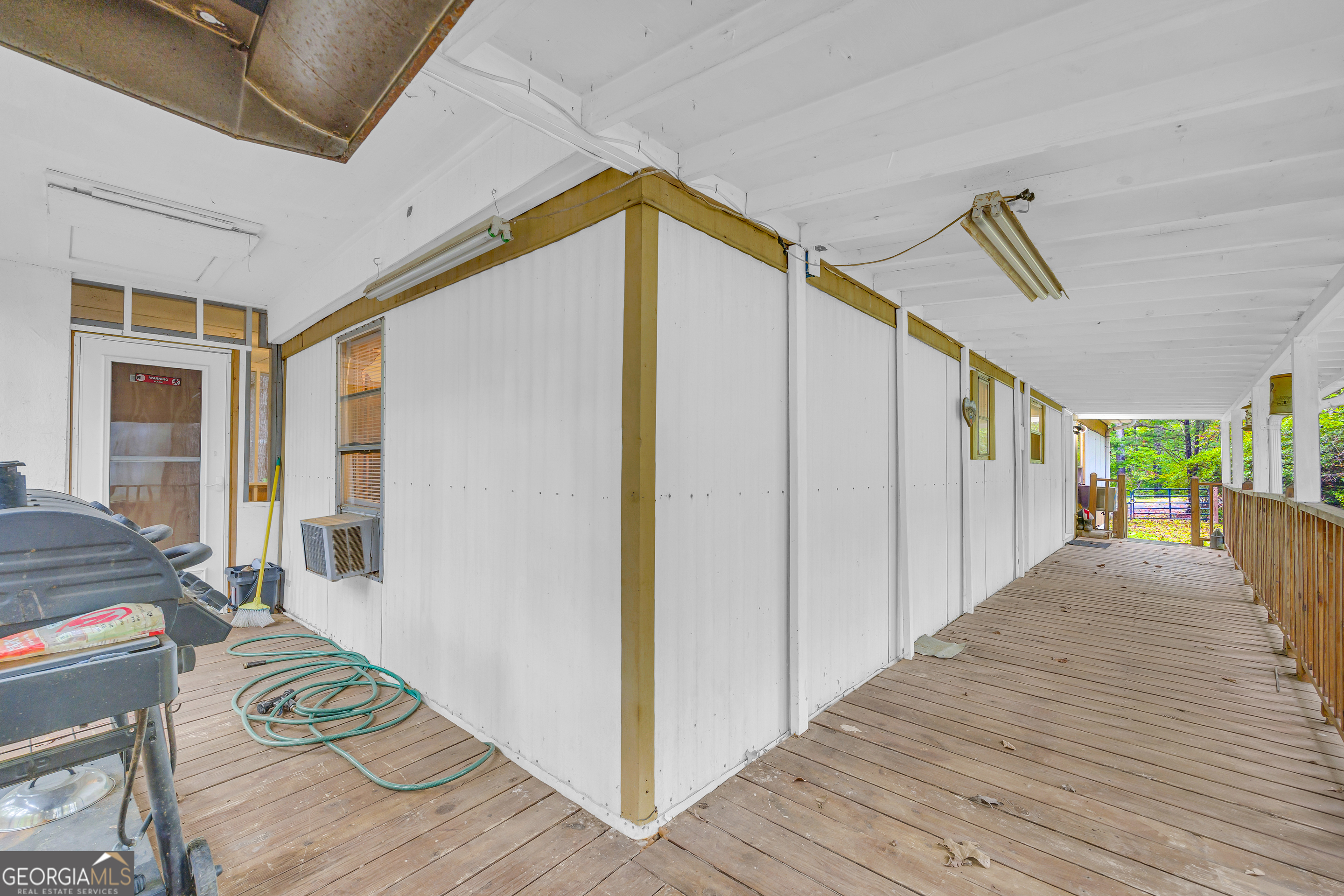 23 Wren Court Toccoa, GA 30577 - Photo 9 of 26 a view of a hallway with wooden floor and windows