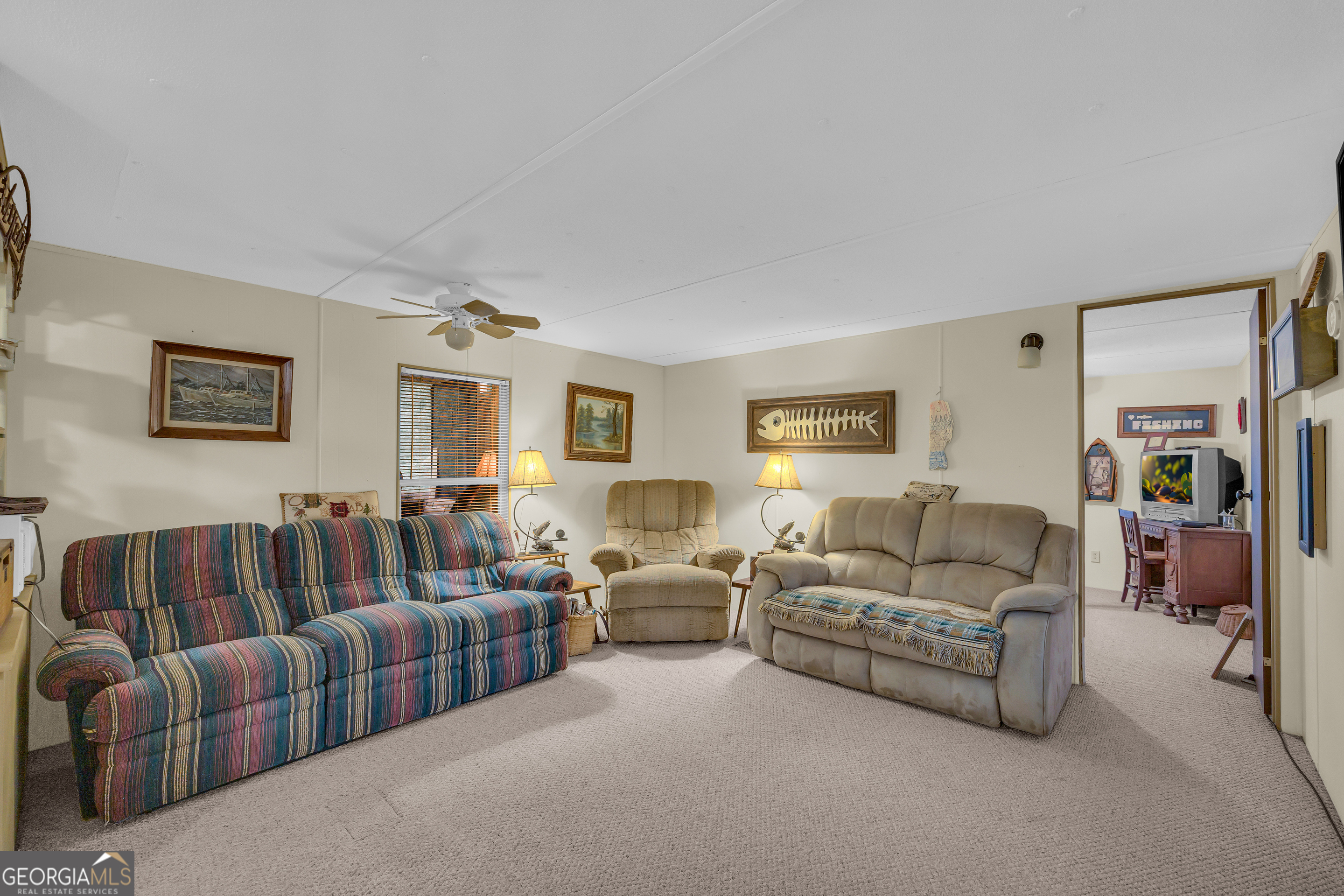 23 Wren Court Toccoa, GA 30577 - Photo 10 of 26 a living room with furniture a couch and a window