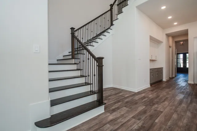 a view of entryway with wooden floor