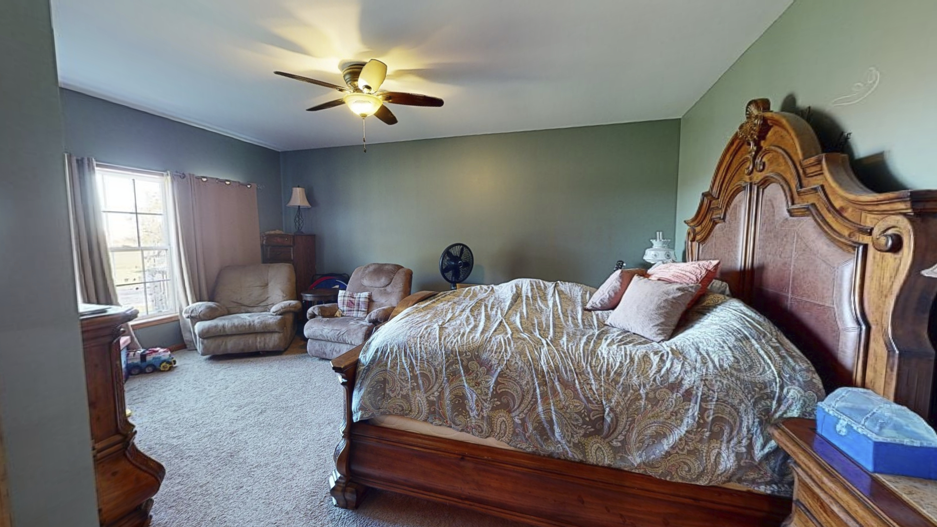 3322 Chicago Road Paw Paw, IL 61353 - Photo 19 of 37 a bed room with a bed and a couch