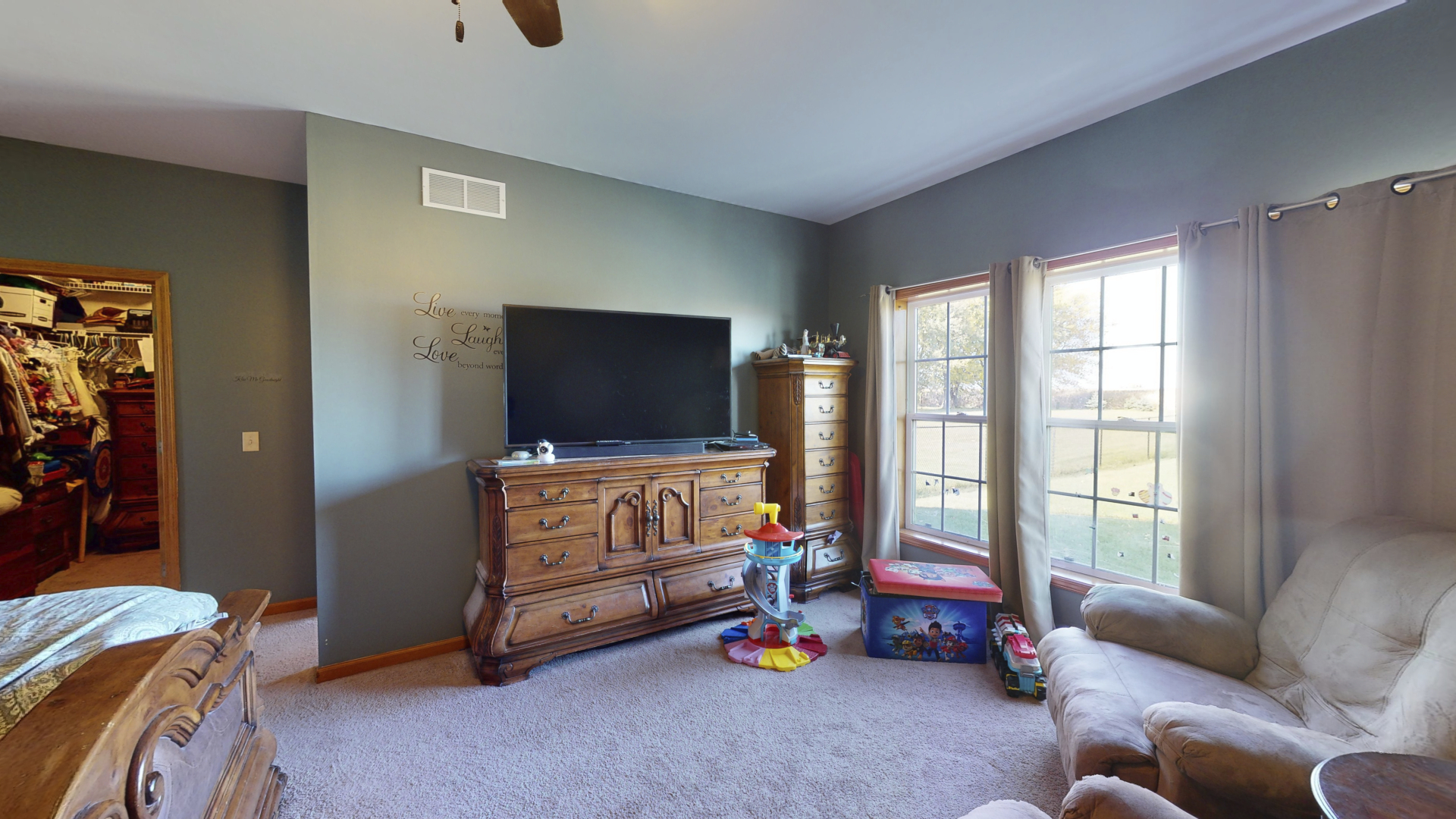 3322 Chicago Road Paw Paw, IL 61353 - Photo 20 of 37 a living room with furniture and a flat screen tv