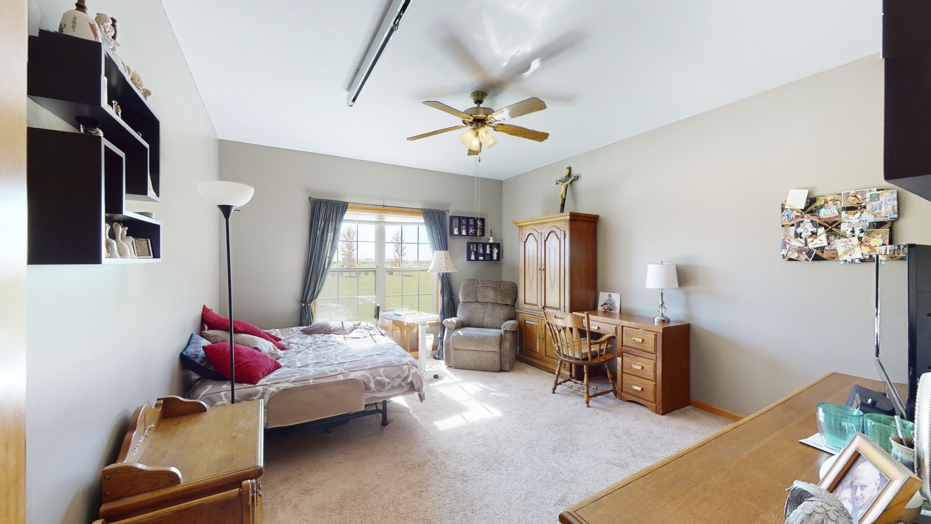 3322 Chicago Road Paw Paw, IL 61353 - Photo 23 of 37 a bedroom with furniture and a large window
