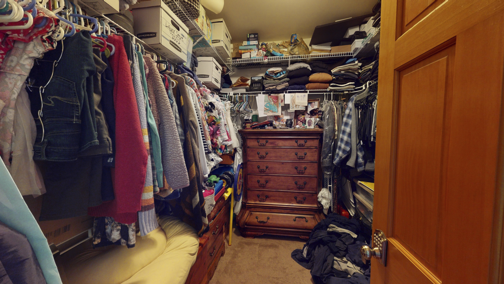 3322 Chicago Road Paw Paw, IL 61353 - Photo 24 of 37 a view of walk in closet with clothes