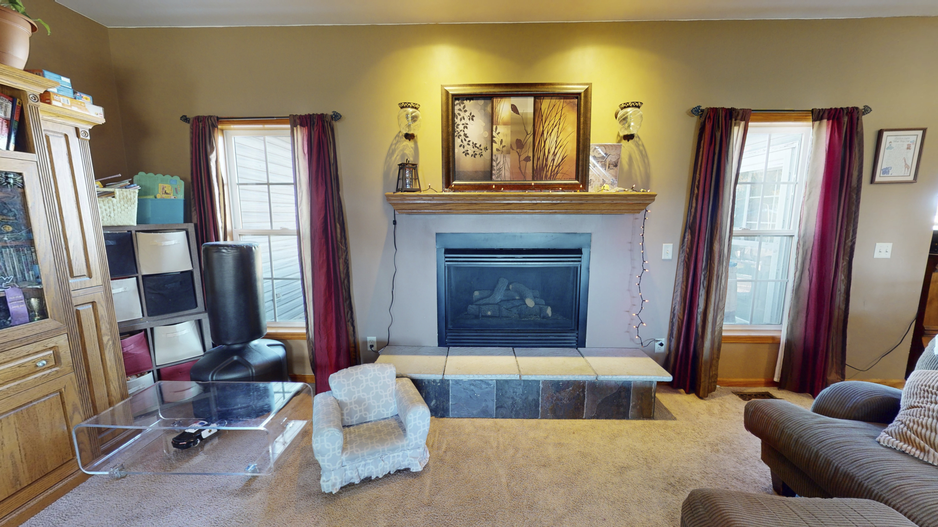 3322 Chicago Road Paw Paw, IL 61353 - Photo 8 of 37 a living room with furniture and a fireplace