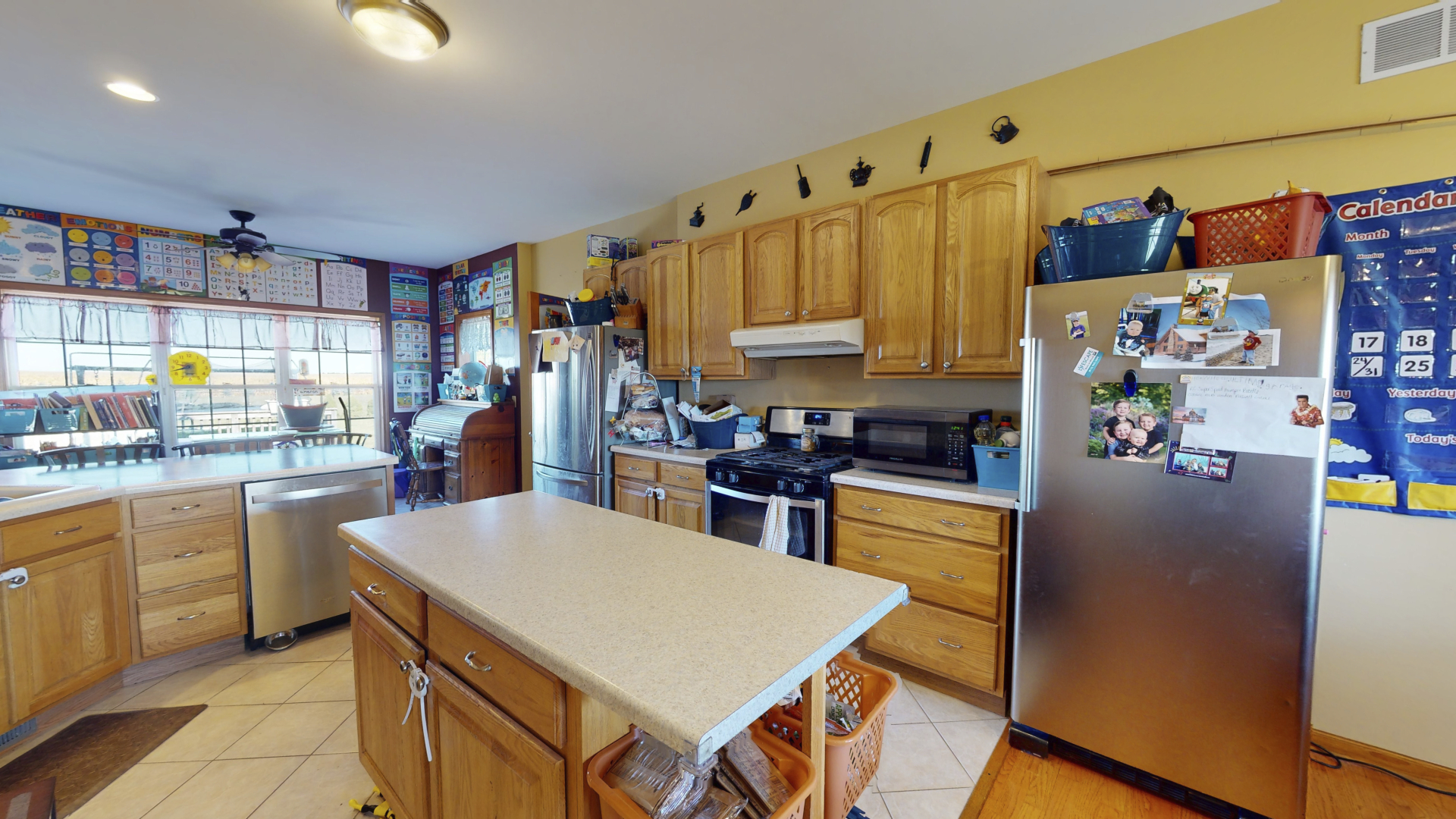 3322 Chicago Road Paw Paw, IL 61353 - Photo 10 of 37 a kitchen with stainless steel appliances granite countertop a refrigerator and a stove top oven