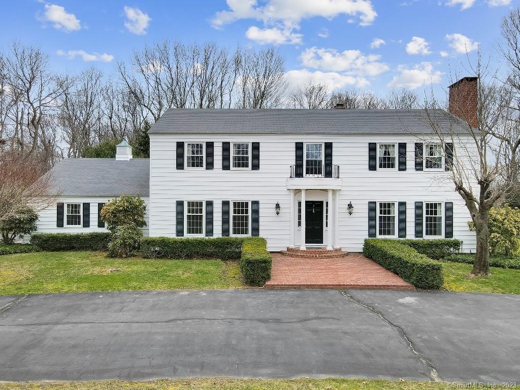 7 Farmingbury Road Wolcott, CT 06716 - Photo 1 of 1 a front view of a house with a yard and potted plants