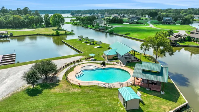 a view of a swimming pool with a patio