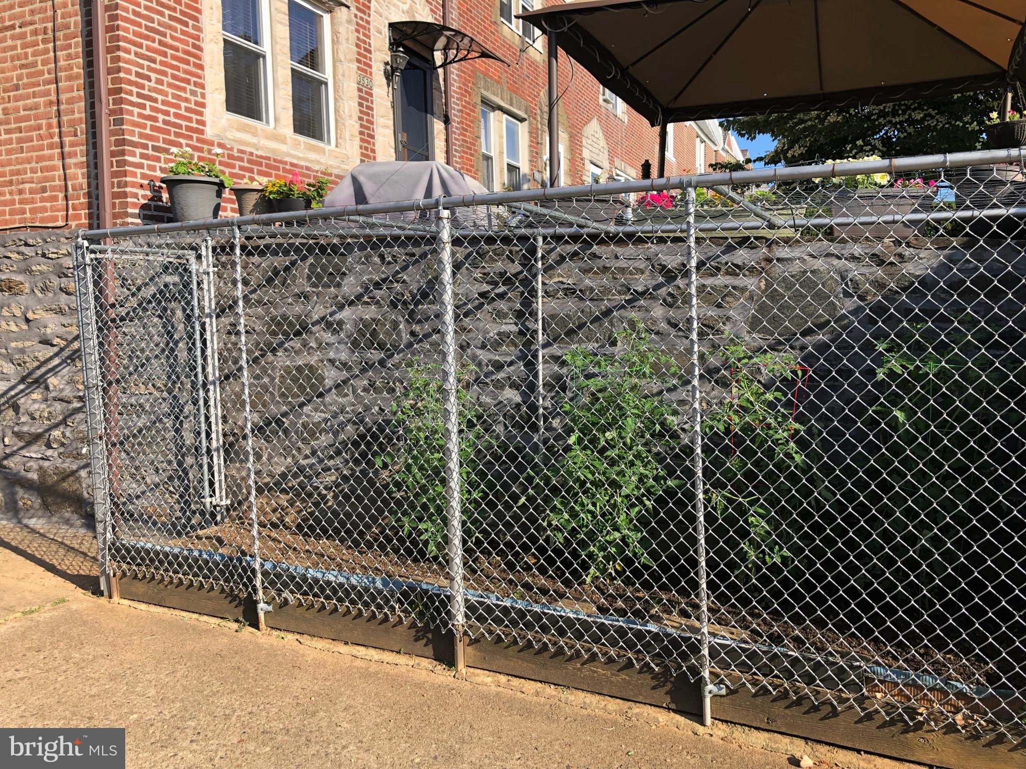 3530 Decatur Street Philadelphia, PA 19136 - Photo 31 of 32 Fenced-in tomato garden