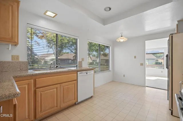 a view of a kitchen with window