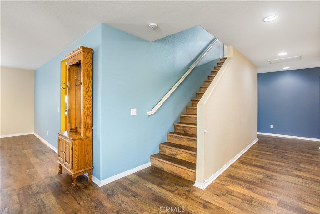 4423 Candelaria Way Perris, CA 92571 - Photo 20 of 42 a view of an entryway with wooden floor