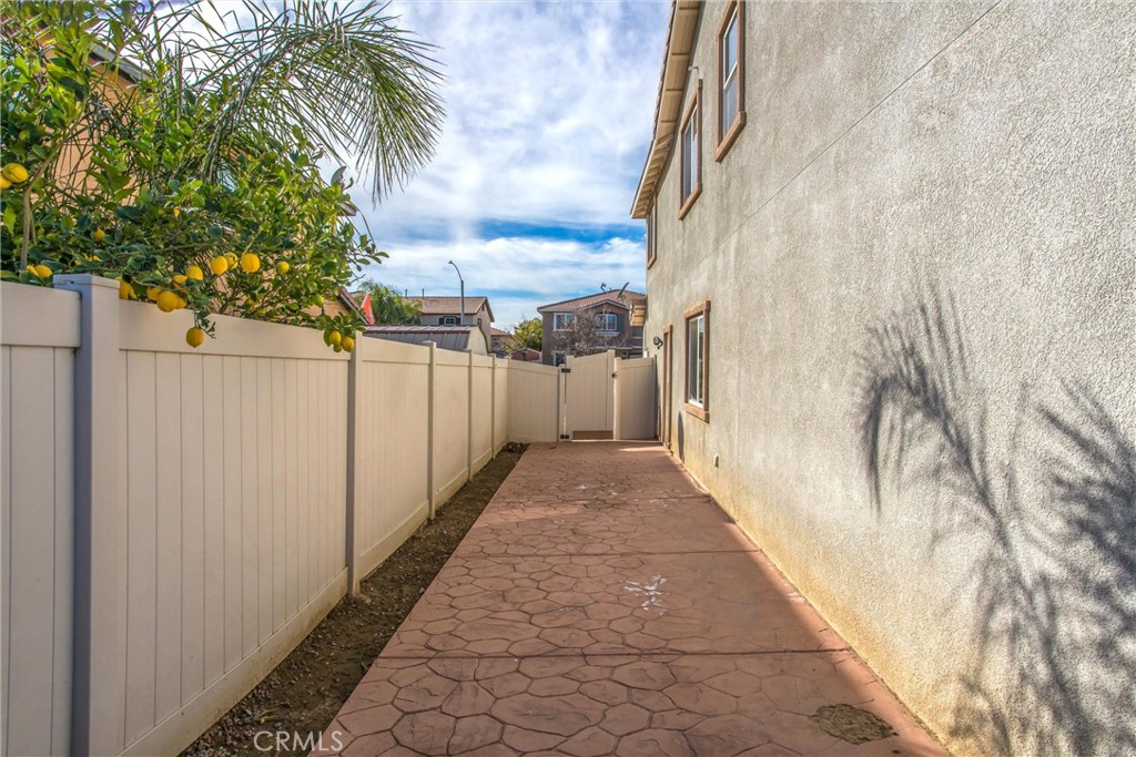 4423 Candelaria Way Perris, CA 92571 - Photo 40 of 42 a view of a pathway with a yard