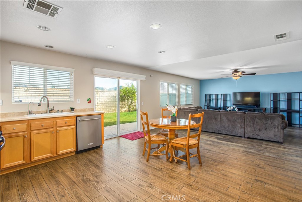 4423 Candelaria Way Perris, CA 92571 - Photo 10 of 42 a living room with furniture and a large window