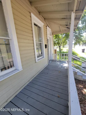 a view of a house with a porch