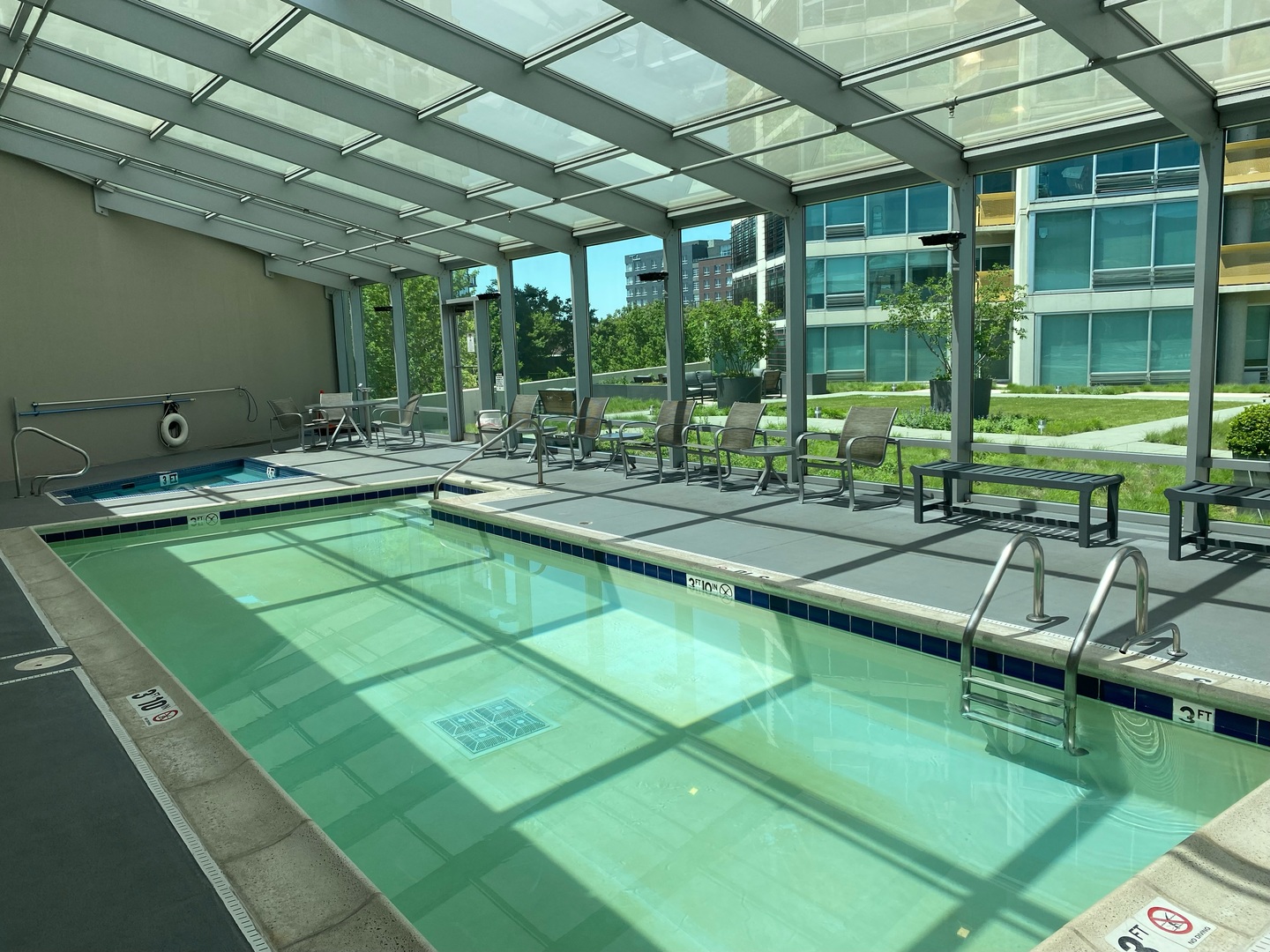 1720 Maple Avenue, Unit 2120 Evanston, IL 60201 - Photo 20 of 21 a swimming pool with outdoor seating and yard