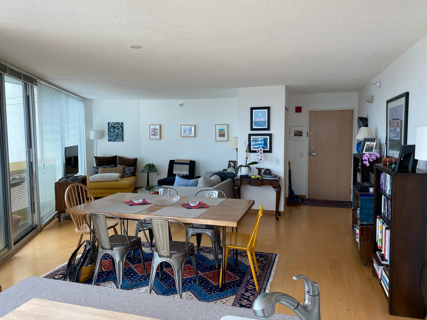 1720 Maple Avenue, Unit 2120 Evanston, IL 60201 - Photo 3 of 21 a view of a dining room with furniture