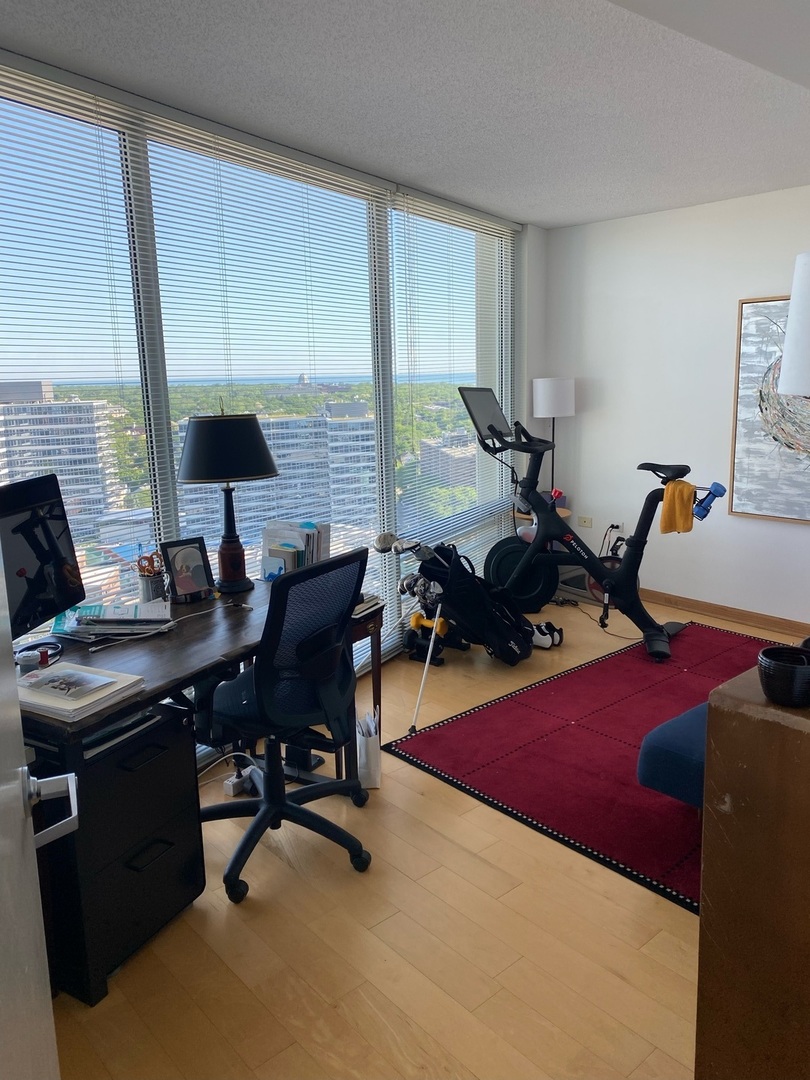 1720 Maple Avenue, Unit 2120 Evanston, IL 60201 - Photo 4 of 21 a view of a workspace with furniture and a window
