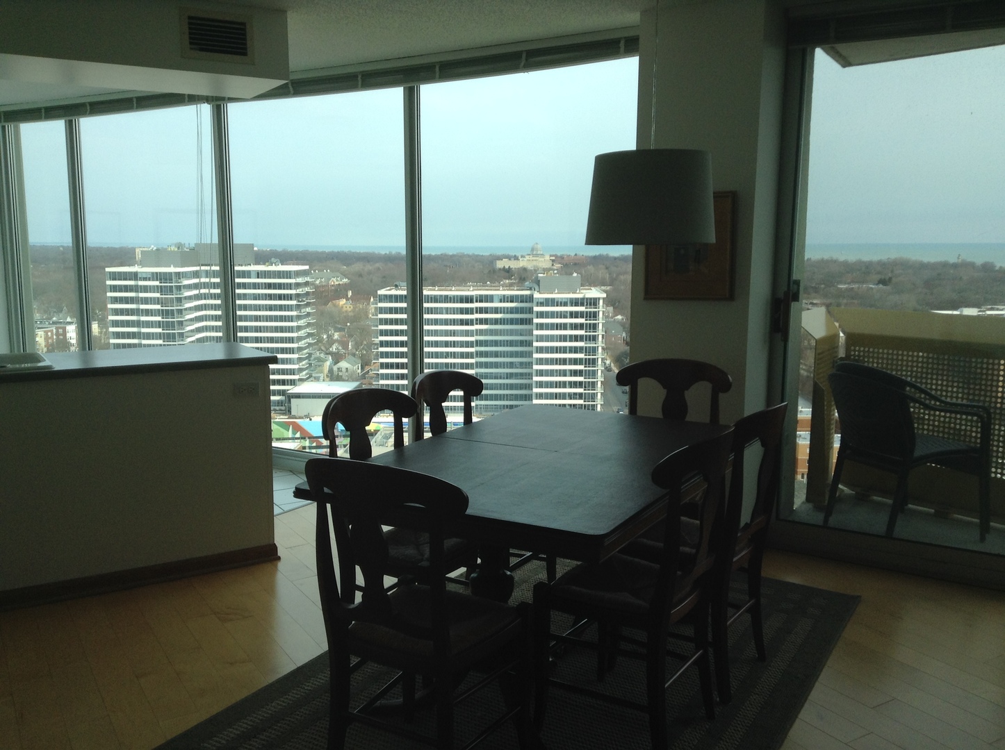 1720 Maple Avenue, Unit 2120 Evanston, IL 60201 - Photo 7 of 21 a view of a dining room with furniture and window