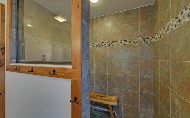 a room with a stove and cabinets