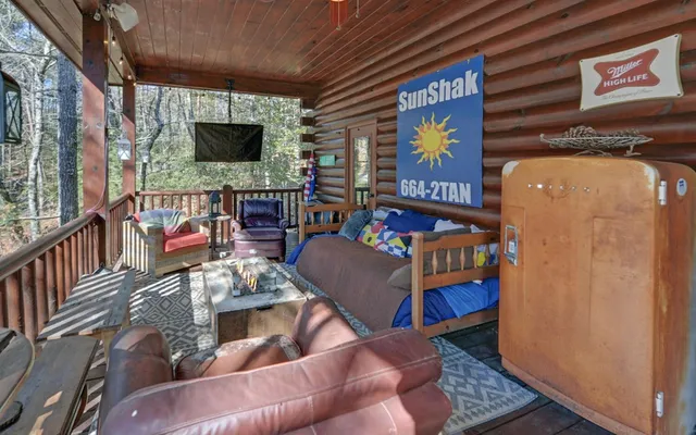 a view of a balcony with a table and chairs