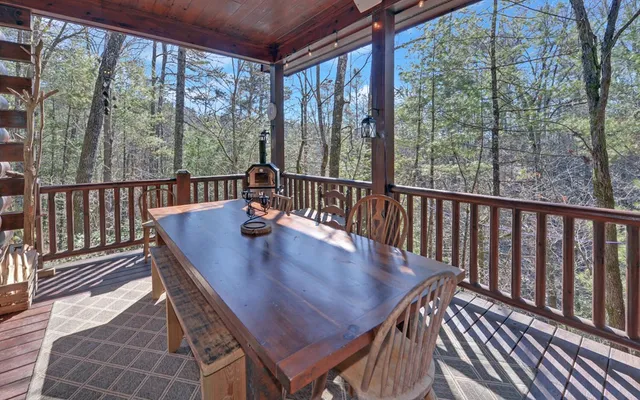 a view of a livingroom with furniture and a window