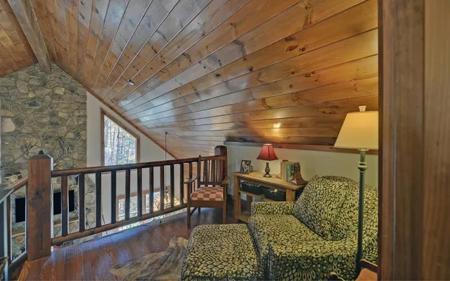 a bedroom with a bed and a bookshelf