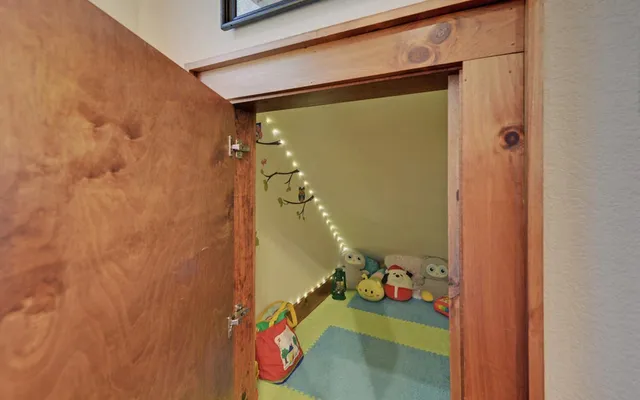 a view of a balcony with wooden floor