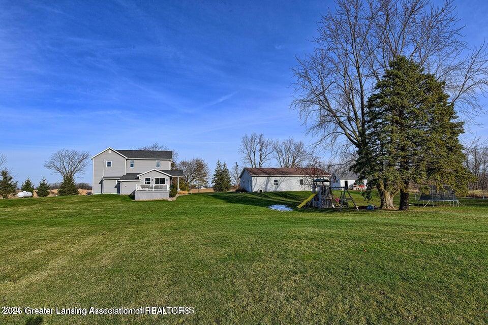 15085 West Cutler Road Portland, MI 48875 - Photo 33 of 52 Yard view of house