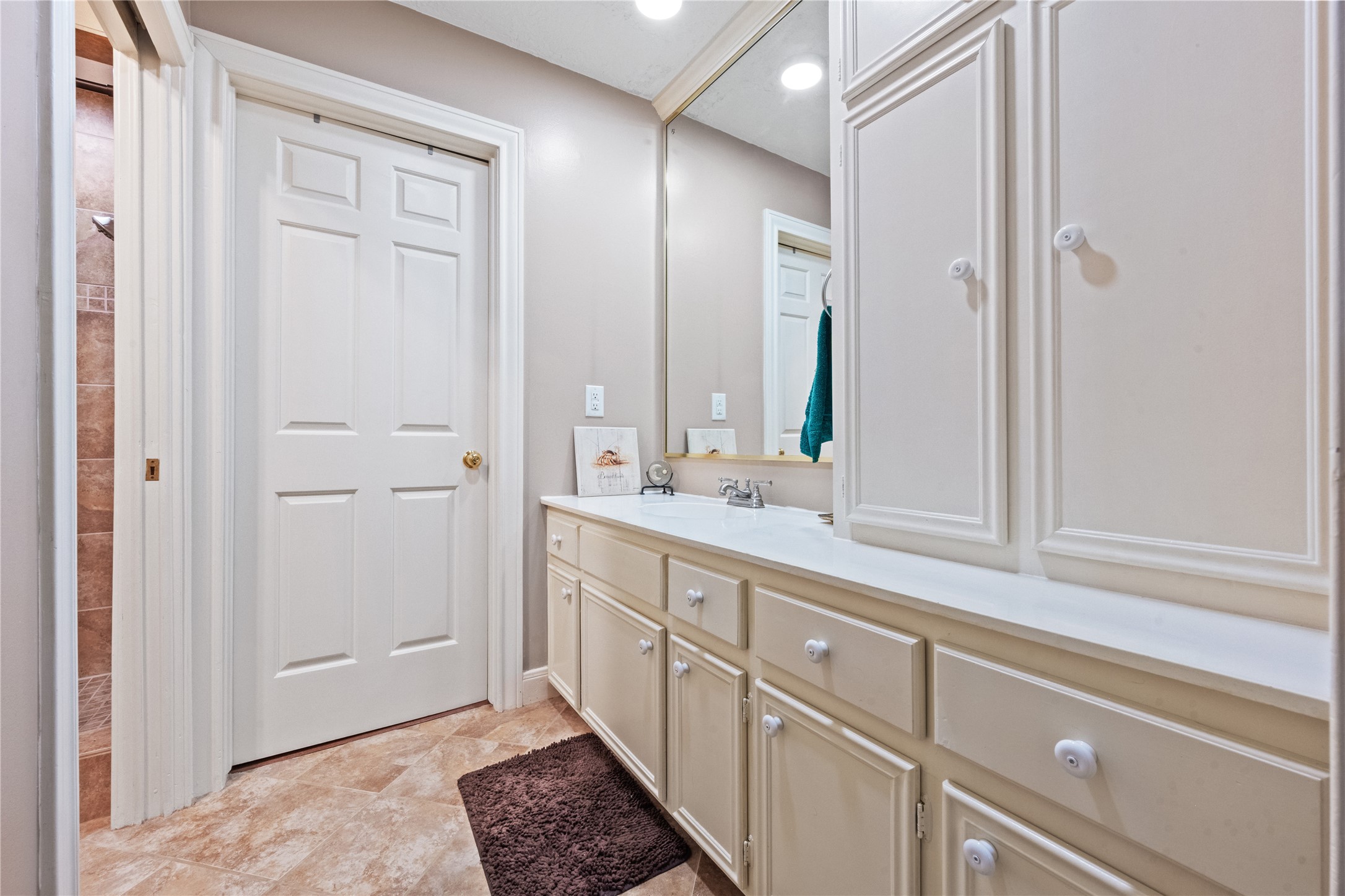 7639 Post Bridge Road Spring, TX 77389 - Photo 25 of 42 a bathroom with a sink and a mirror