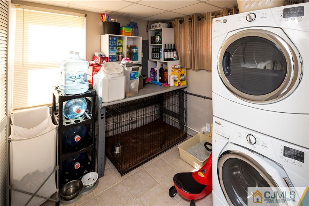 122 Ridge Road Colonia, NJ 07067 - Photo 14 of 25 a utility room with dryer and washer