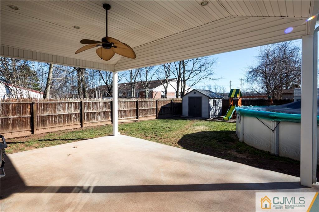 122 Ridge Road Colonia, NJ 07067 - Photo 22 of 25 a view of a porch with a backyard