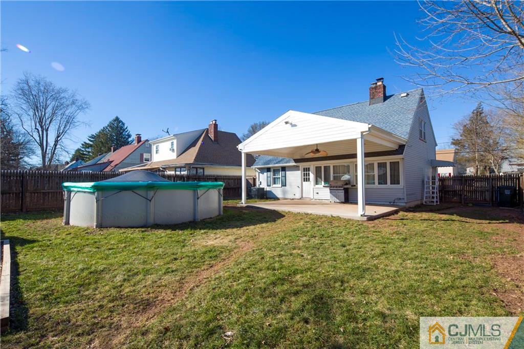 122 Ridge Road Colonia, NJ 07067 - Photo 24 of 25 a view of a house with a yard porch and sitting area
