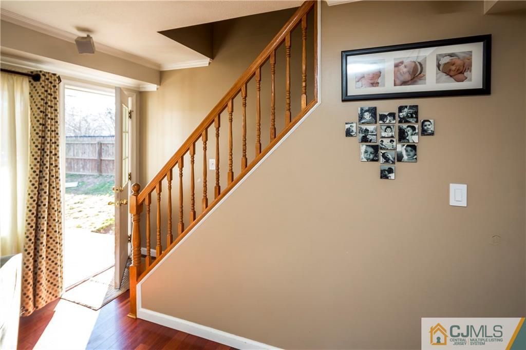 122 Ridge Road Colonia, NJ 07067 - Photo 8 of 25 a view of entryway with wooden floor