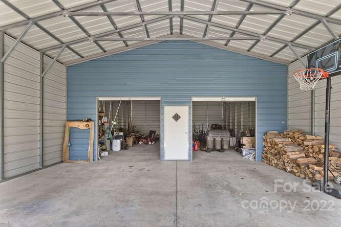 1411 Bailey Branch Road Burnsville, NC 28714 - Photo 36 of 40 a view of a chairs with window