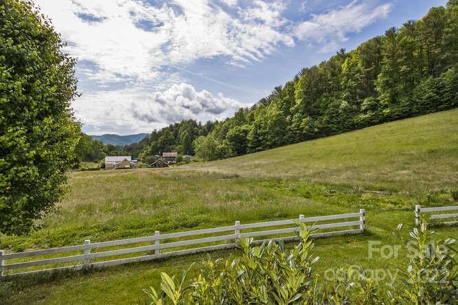 1411 Bailey Branch Road Burnsville, NC 28714 - Photo 40 of 40 a view of an ocean and mountain