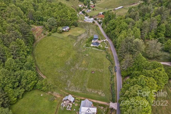 1411 Bailey Branch Road Burnsville, NC 28714 - Photo 5 of 40 a bird view of a garden