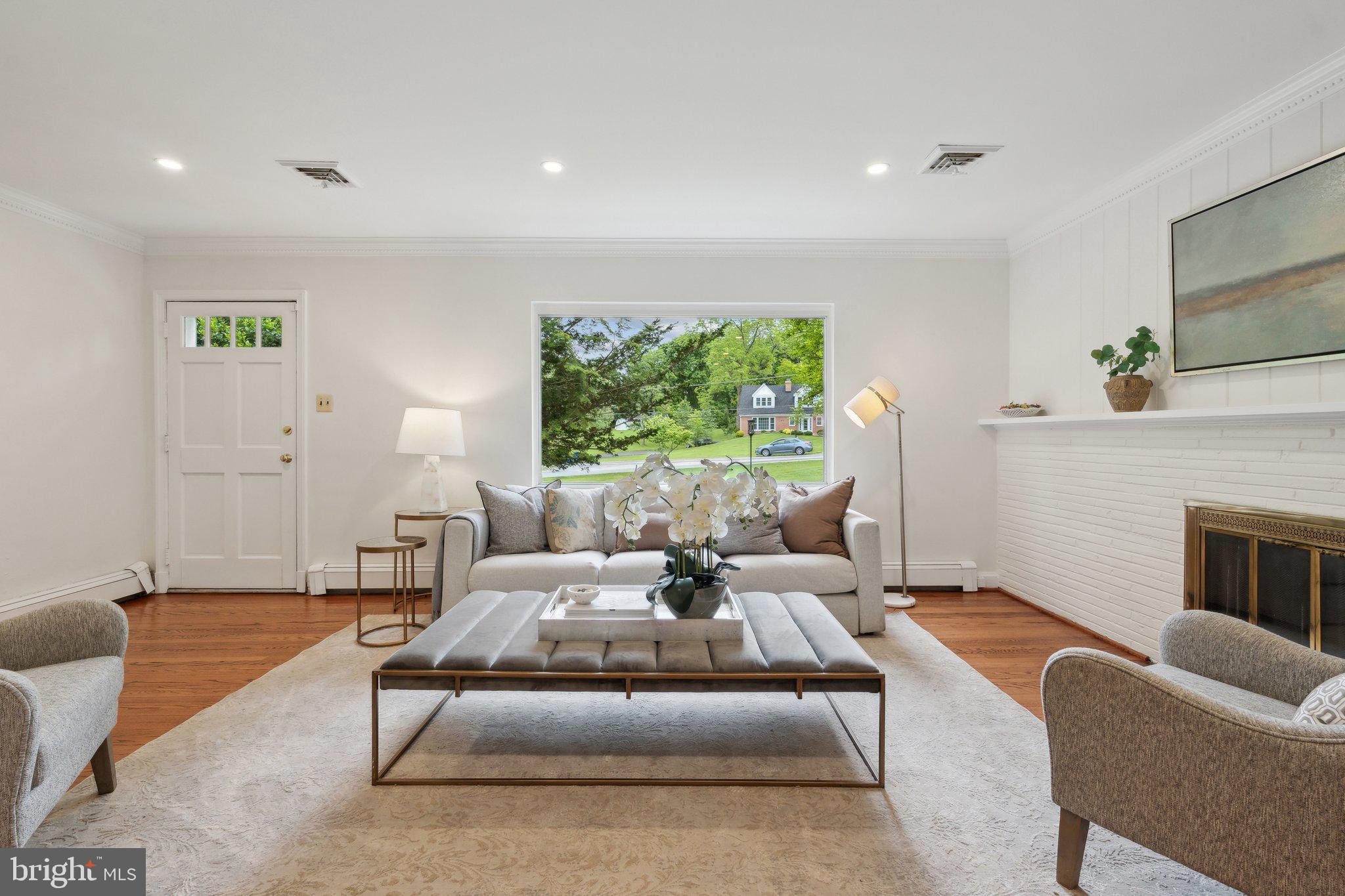 701 Notley Road Silver Spring, MD 20904 - Photo 16 of 60 a living room with furniture fireplace and window