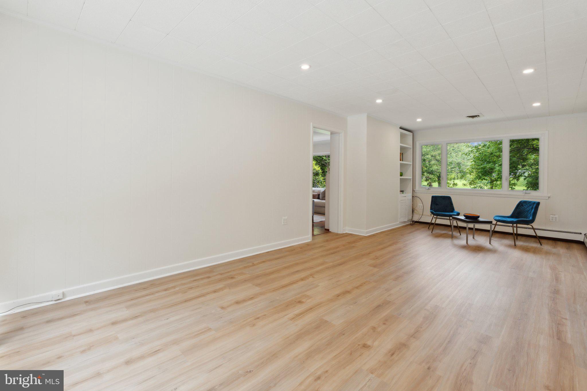 701 Notley Road Silver Spring, MD 20904 - Photo 22 of 60 a room with furniture and a wooden floor